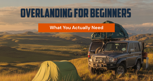 Golden-hour overlanding camp — 4x4 with rooftop tent and ground tent on a grassy rise. TerrainVault guide: Overlanding for Beginners, what you actually need.