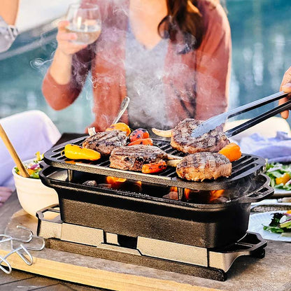 Someone flipping pork chops while grilling near pool.