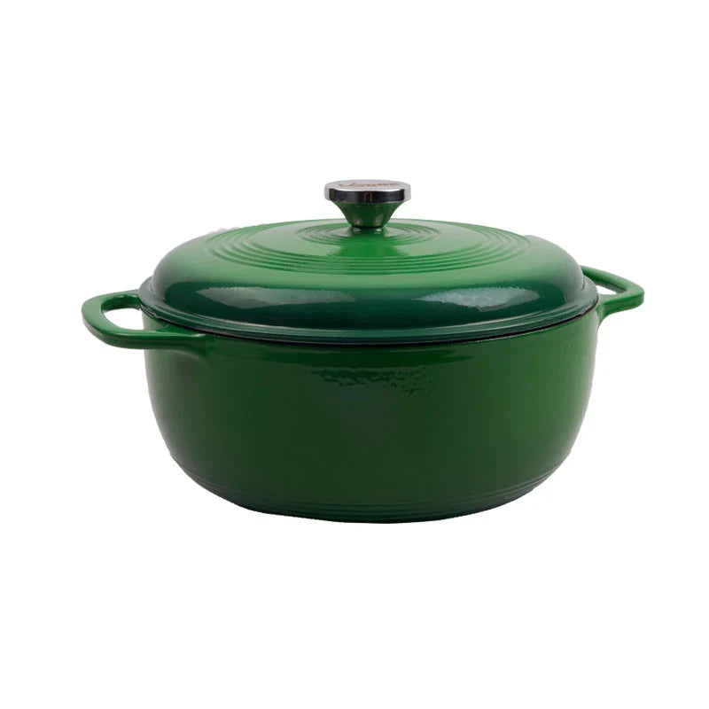 Green gradient enameled cast iron Dutch oven with lid, both pieces have light green on top and darken towards the bottom.
