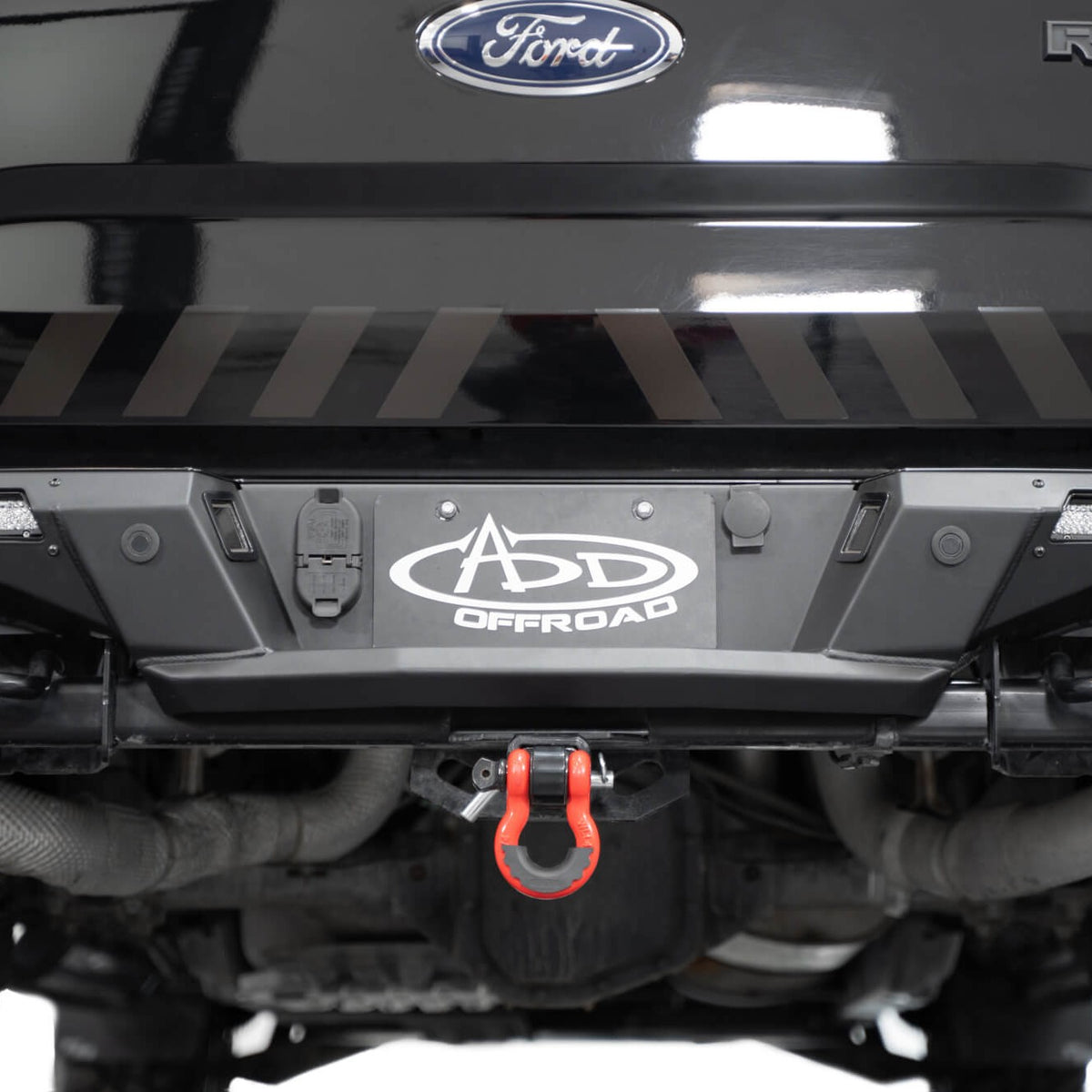 The 2017-2020 Ford F-150 Raptor Phantom Rear Bumper retains factory functionality
