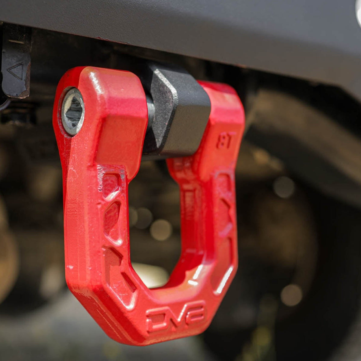 Red d-ring attached to a vehicle's undercarriage