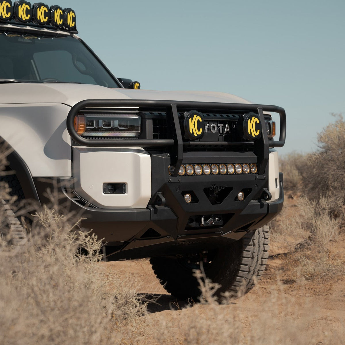Side angle shot of the Center Mount Winch Front Bumper and Brush Guard for the 250 Series Land Cruiser