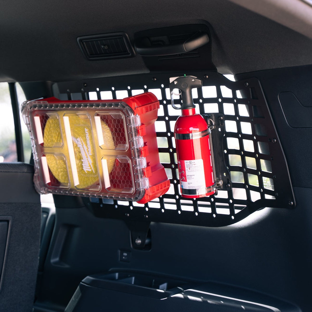 Toolkit and extinguisher on the 2024 Toyota Land Cruiser Rear Window Molle Storage Panels