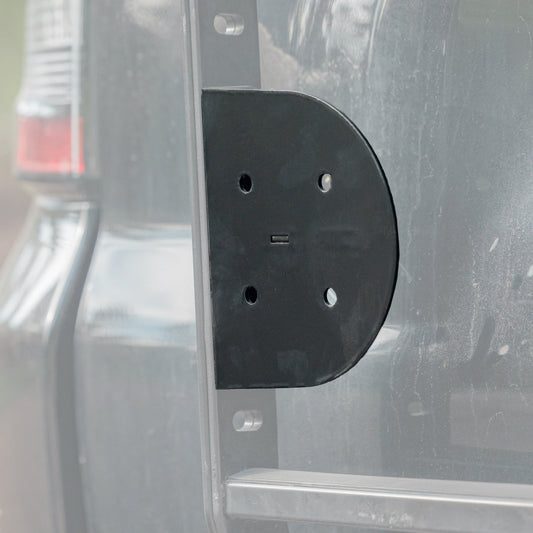 Cover photo of the C4 RotopaX mount for the Summit Hatch Ladder with the background faded out and emphasis on the mount itself.