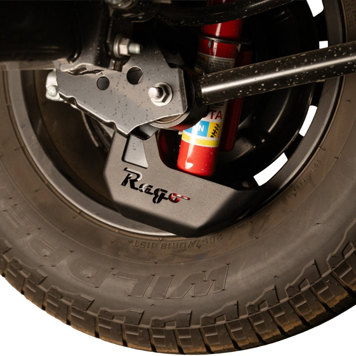 A Rago Shock Guard protecting a 6th Gen 4Runner shock.
