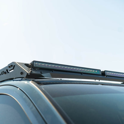 Two 20" light bars on the 6th Gen Toyota 4Runner Roof Rack Light Cutout