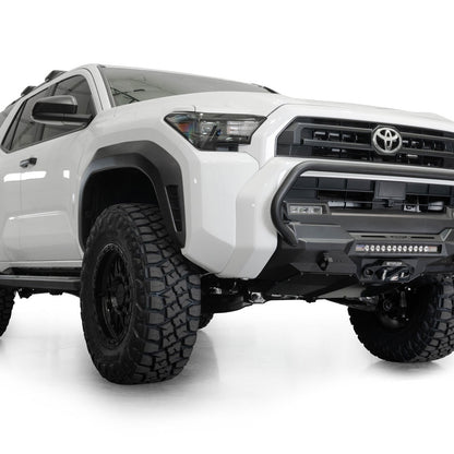 2025 Toyota 4Runner Stealth Center Mount Front Bumper with Top Hoop with lifted suspension and off-road tires on a white background