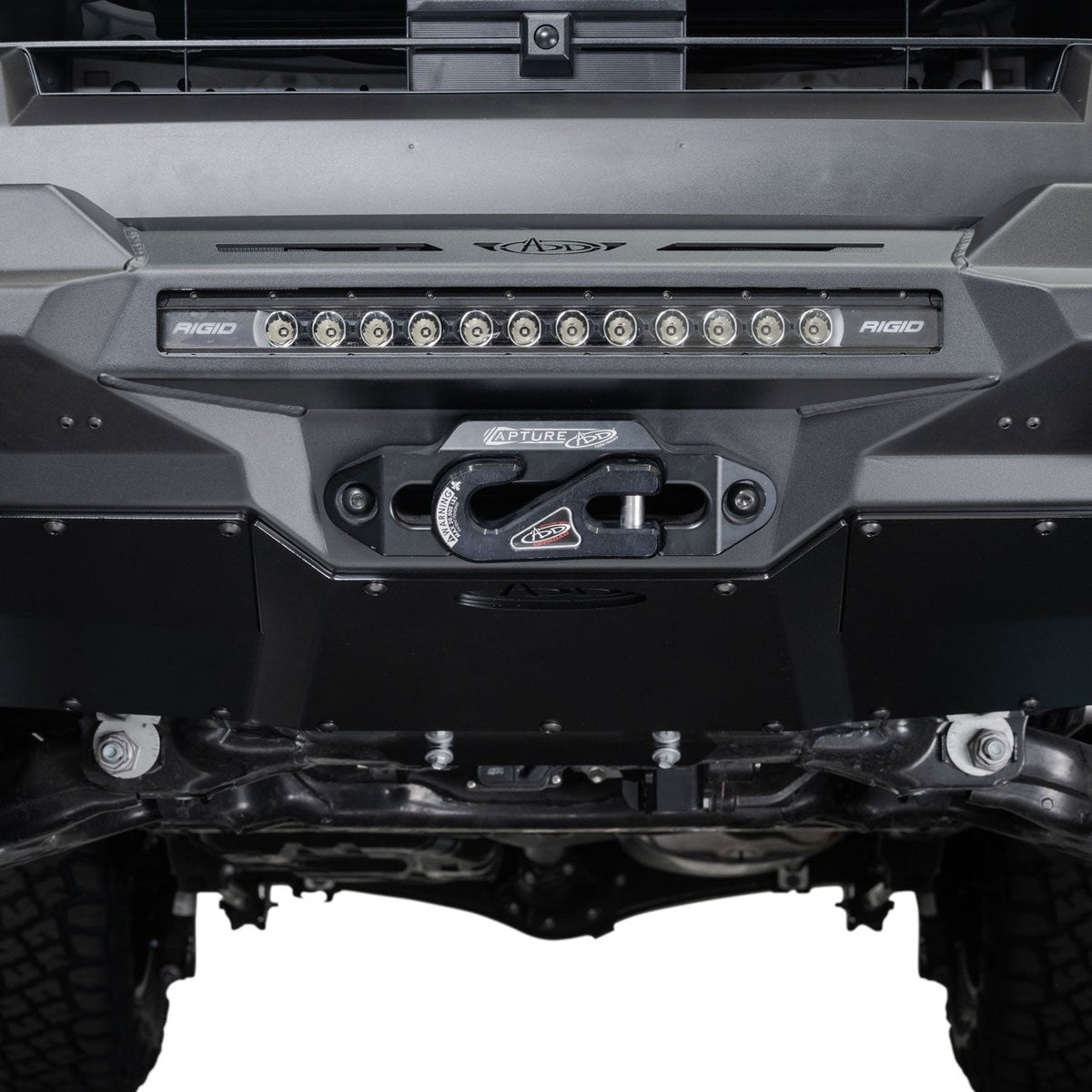Close-up of 2025 Toyota 4Runner Stealth Center Mount Front Bumper with Top Hoop light and winch on a white background