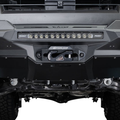 Close-up of 2025 Toyota 4Runner Stealth Center Mount Front Bumper with Top Hoop light and winch on a white background