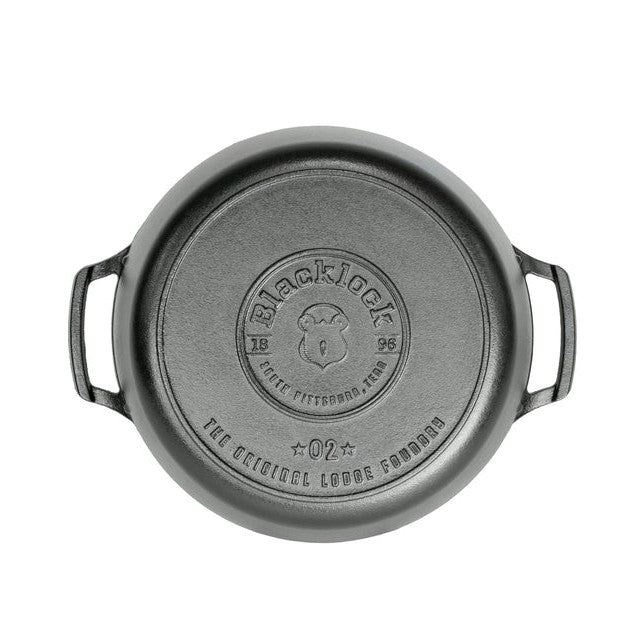 Bottom of dutch oven featuring Blacklock logo.