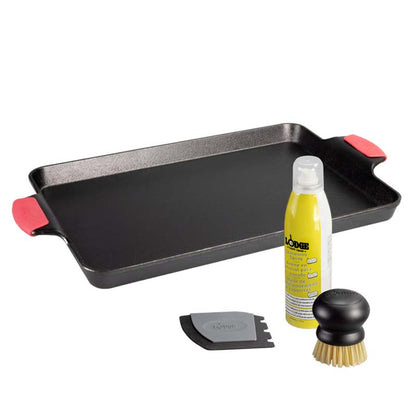 Baking set with a baking pan, brush, scraper, and seasoning spray bottle.