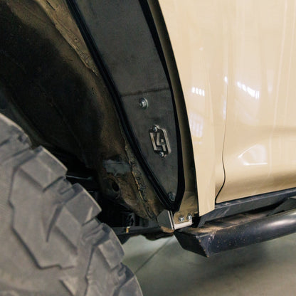 Close up view of the C4 high clearance fender liner at the back and bottom of the 5th Gen 4Runner's wheel well.