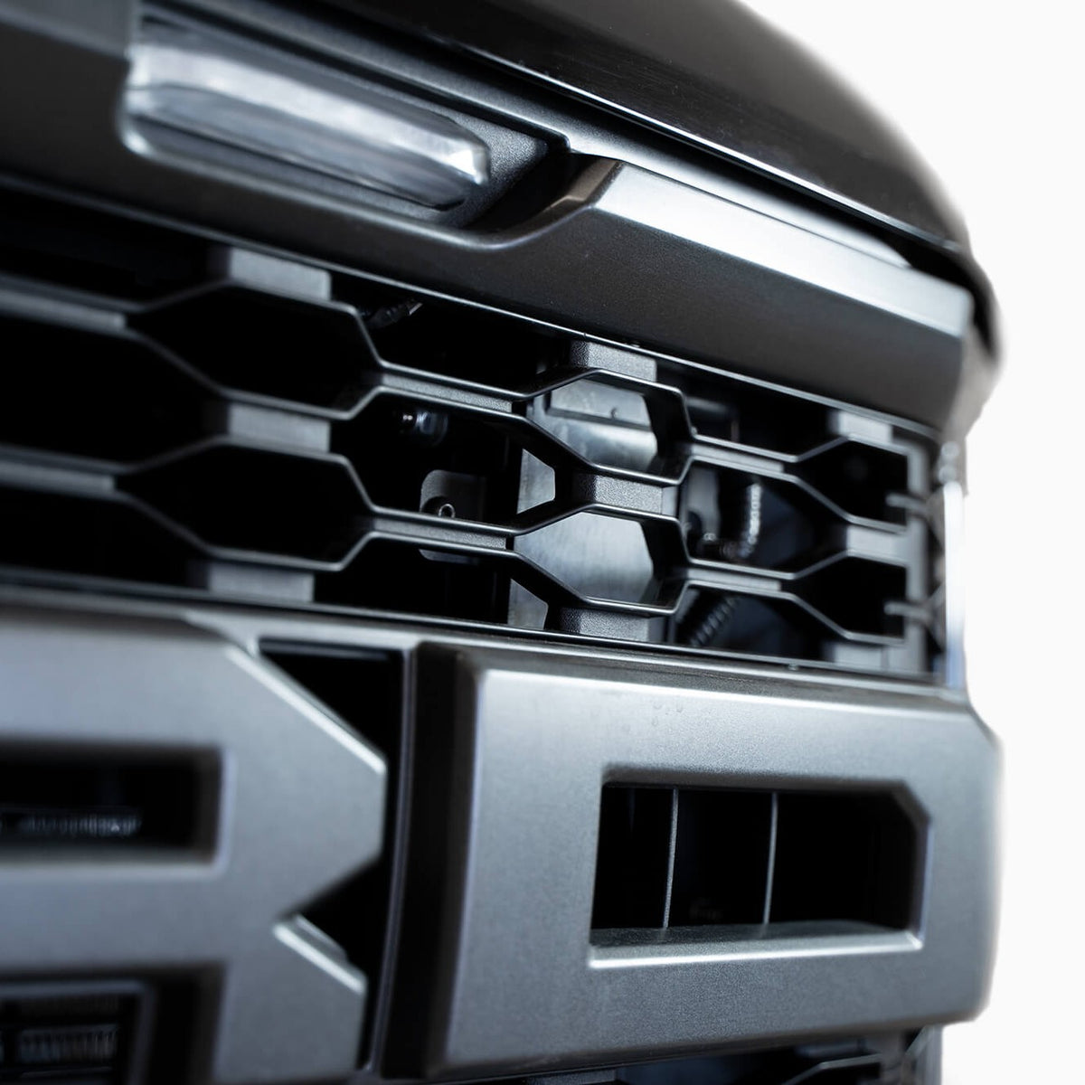 Addictive Desert Designs F-150 Raptor ACC Relocation Bracket — image 1