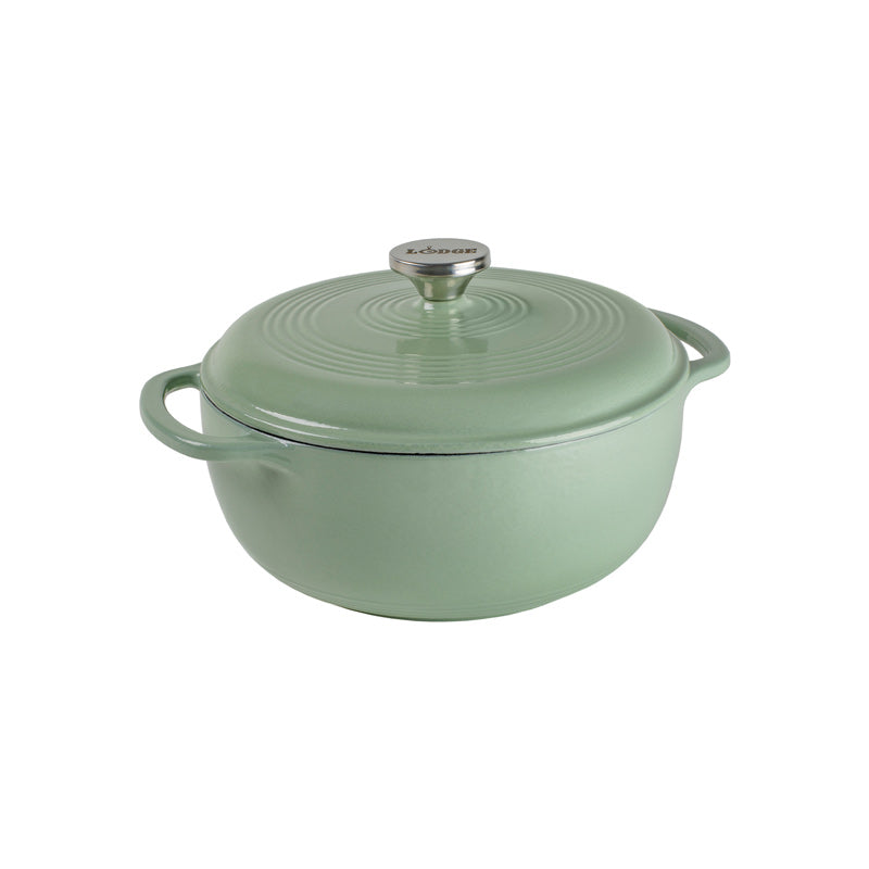 Desert Sage enameled cast iron Dutch oven with lid on a white background