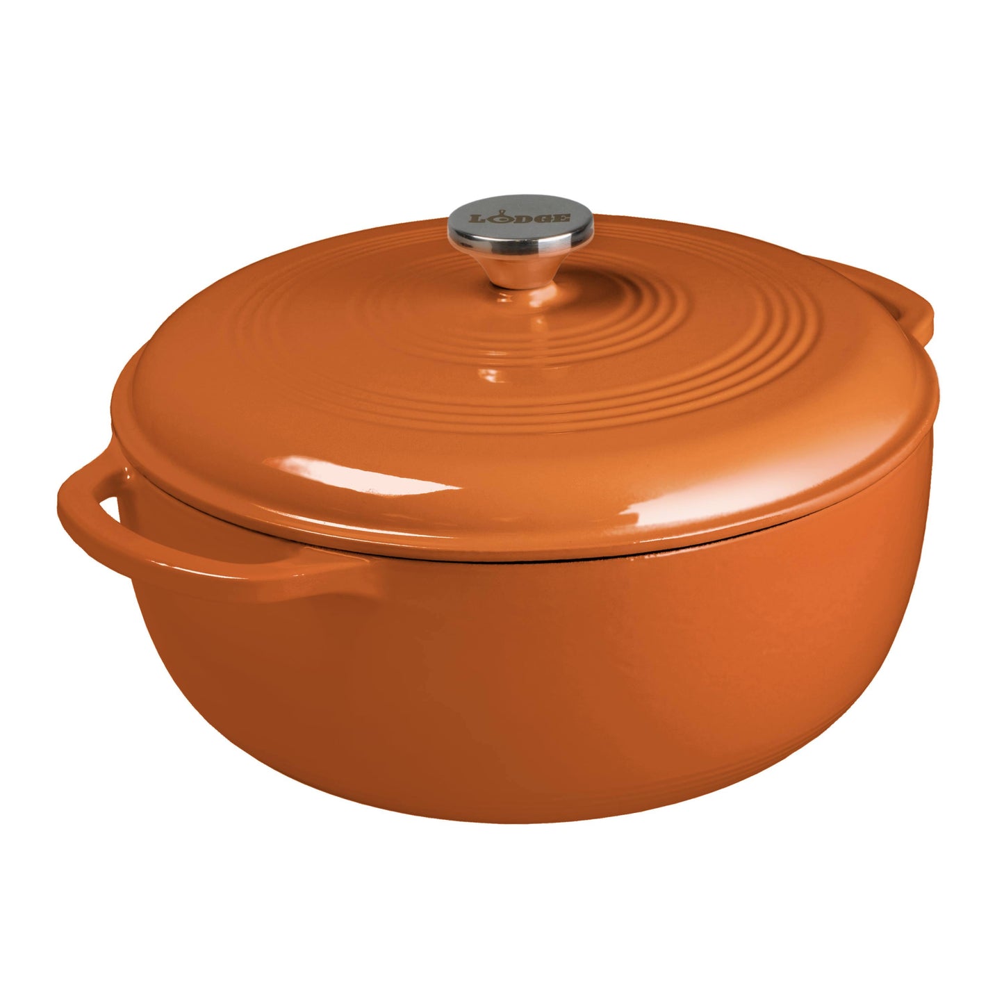 Pumpkin enameled cast iron Dutch oven with lid on a white background