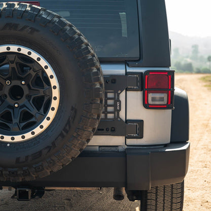 Back view of a vehicle with Jeep Wrangler JK Tailgate Reinforcement Molle Panel