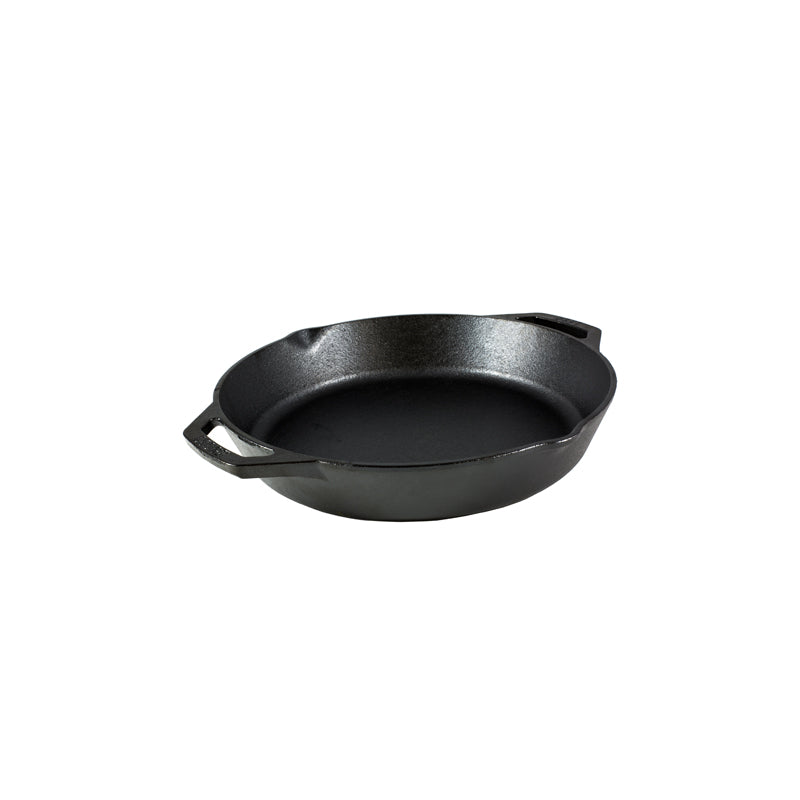 Black cast iron skillet with two loop handles and two pour spots.