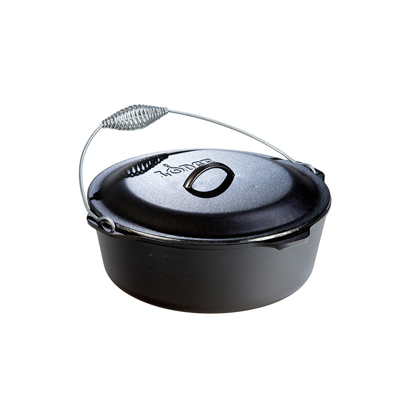 Black cast iron Dutch oven with lid and a silver handle.