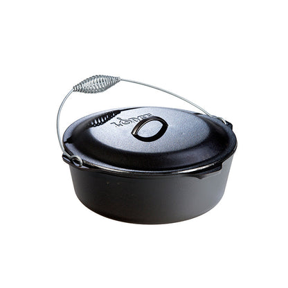 Black cast iron Dutch oven with lid and a silver handle.