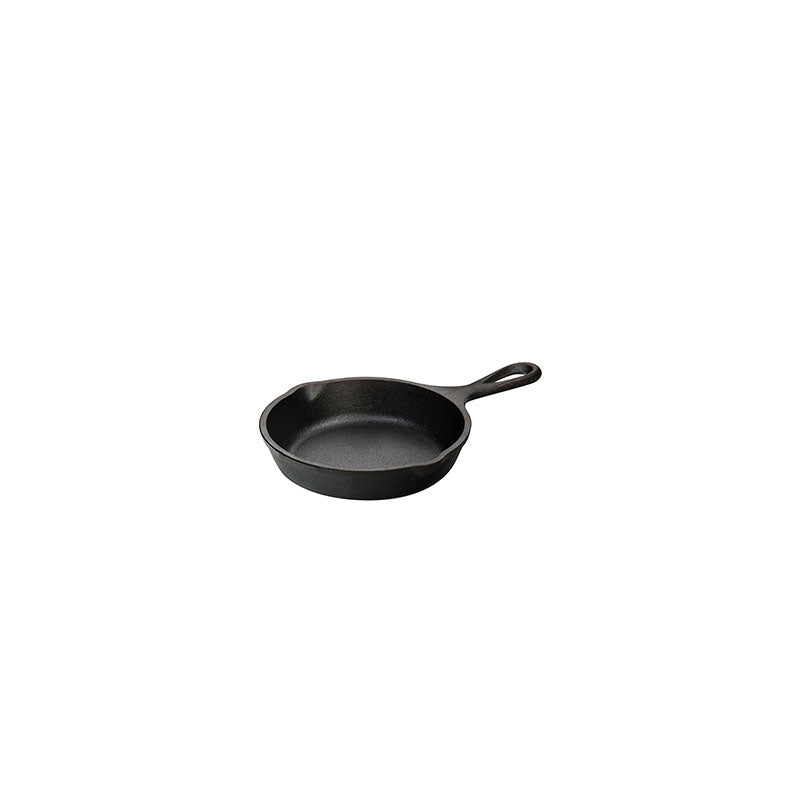 Cast iron skillet with one long handle, there's a pour spout on the left and right side.