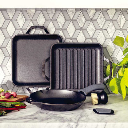 Cookware set displayed on kitchen counter.