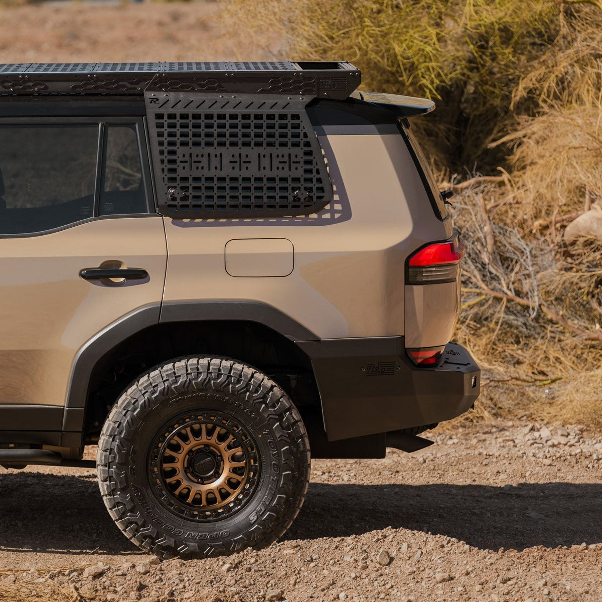 The full-width, steel, off-road rear bumper for the Lexus GX 550 rises high on the sides to offer fantastic protection from rocks and debris.