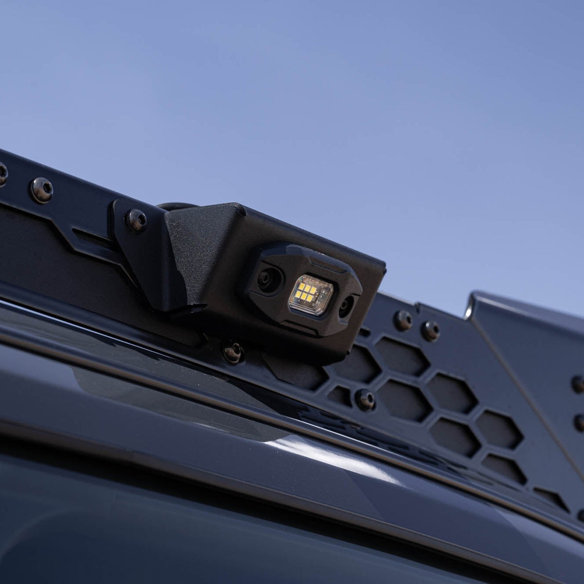 Mounted on a roof rack in off-setting.