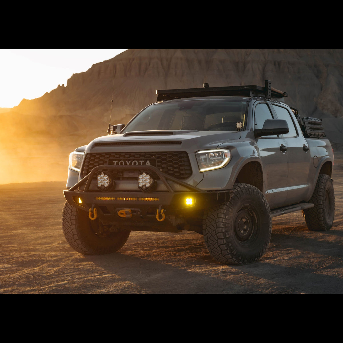 US-made steel winch bumper from C4 Fabrication installed on a grey Tundra.