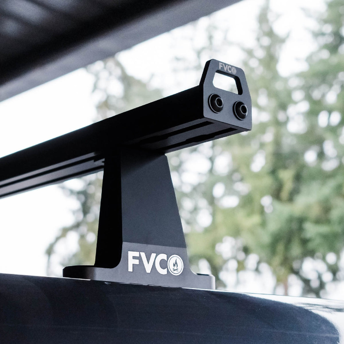 View of Standard 59.75" wide crossbars with Sprinter Crossbar Roof Rack towers on high roof van
