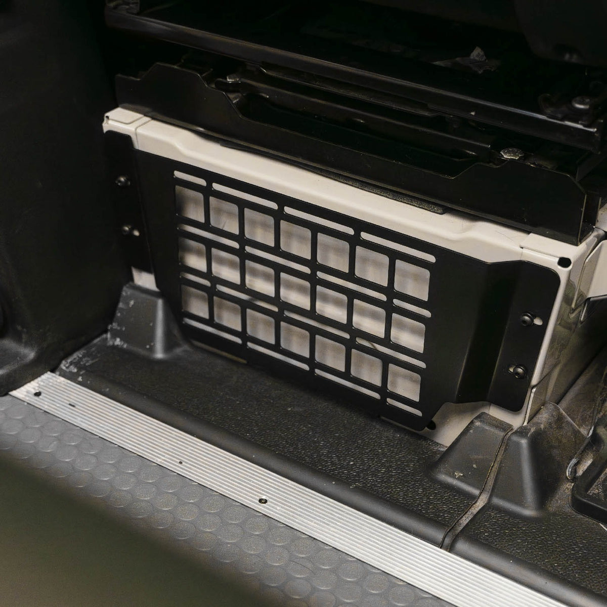 Sprinter Van Seat Base Molle Panel installed on driver's seat base