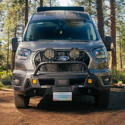 Ford Transit van with Transit Core Front Bumper parked at camp