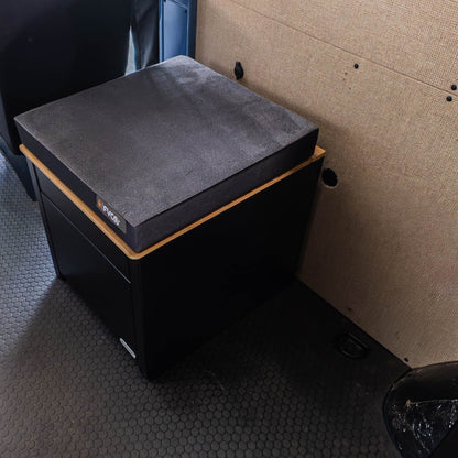 Portable Toilet Storage Cubby installed in adventure van ready for family weekends