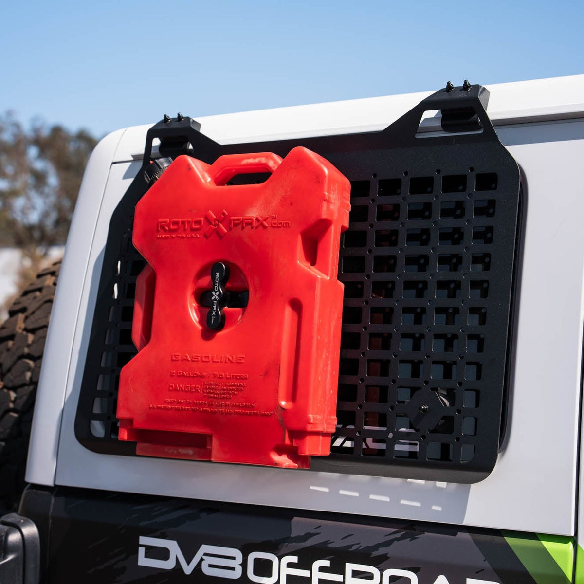 Universal Molle Panel Rotopax Mount installed with fuel jug