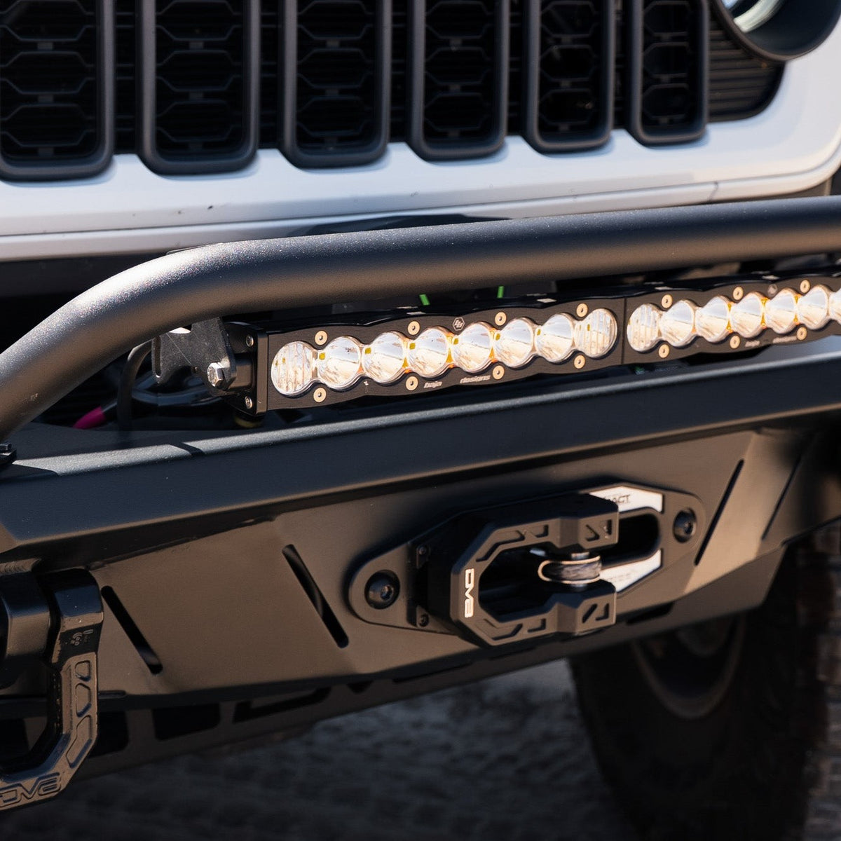 Universal Spec Series Bull Bar installed to DV8 Spec Series bumper with light bar attached