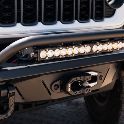 Universal Spec Series Bull Bar installed to DV8 Spec Series bumper with light bar attached