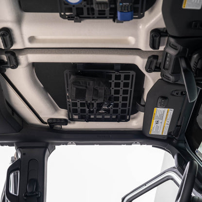 Jeep Wrangler JL Roof Mounts with 15” x 12” Molle Panel installed with bag and glasses mounted