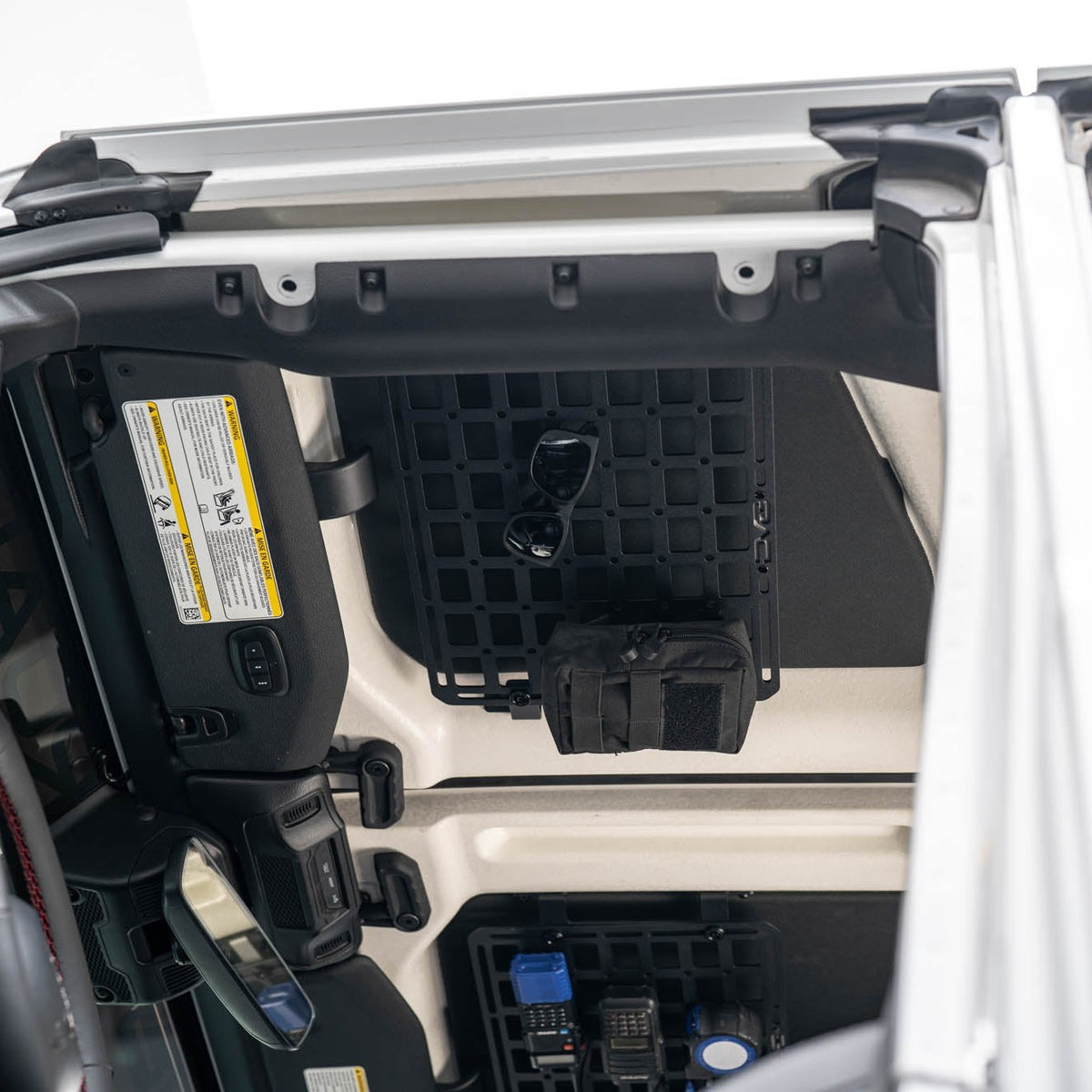 Jeep Wrangler JL Roof Mounts with 15” x 12” Molle Panel installed on driver side