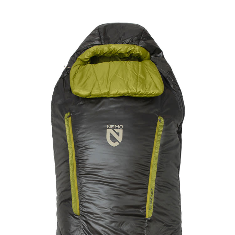 A black and green NEMO Equipment Forte™ Endless Promise® Men's Synthetic Sleeping Bag featuring a hood and two vertical zippered front pockets.