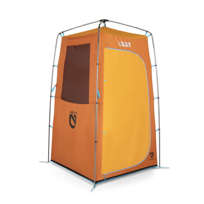 The NEMO Equipment Heliopolis™ Privacy Shelter & Shower Tent, shown in orange and yellow with a window and zippered door, features a metal frame. Perfect for use as a portable shower tent while camping or enjoying the outdoors.
