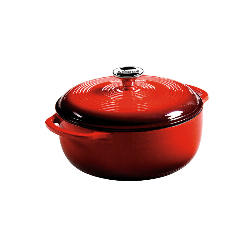 Red gradient enameled cast iron Dutch oven with lid, both pieces have light red on top and darken towards the bottom.