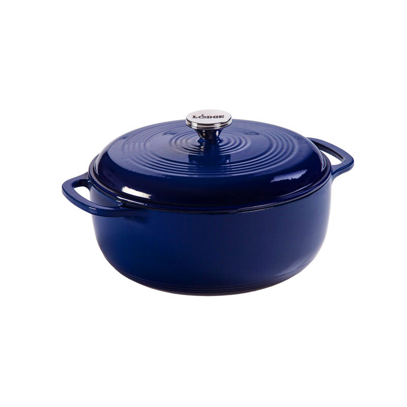 Indigo enameled cast iron Dutch oven with lid on a white background