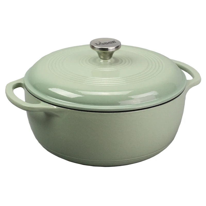 Desert Sage enameled cast iron Dutch oven with lid on a white background
