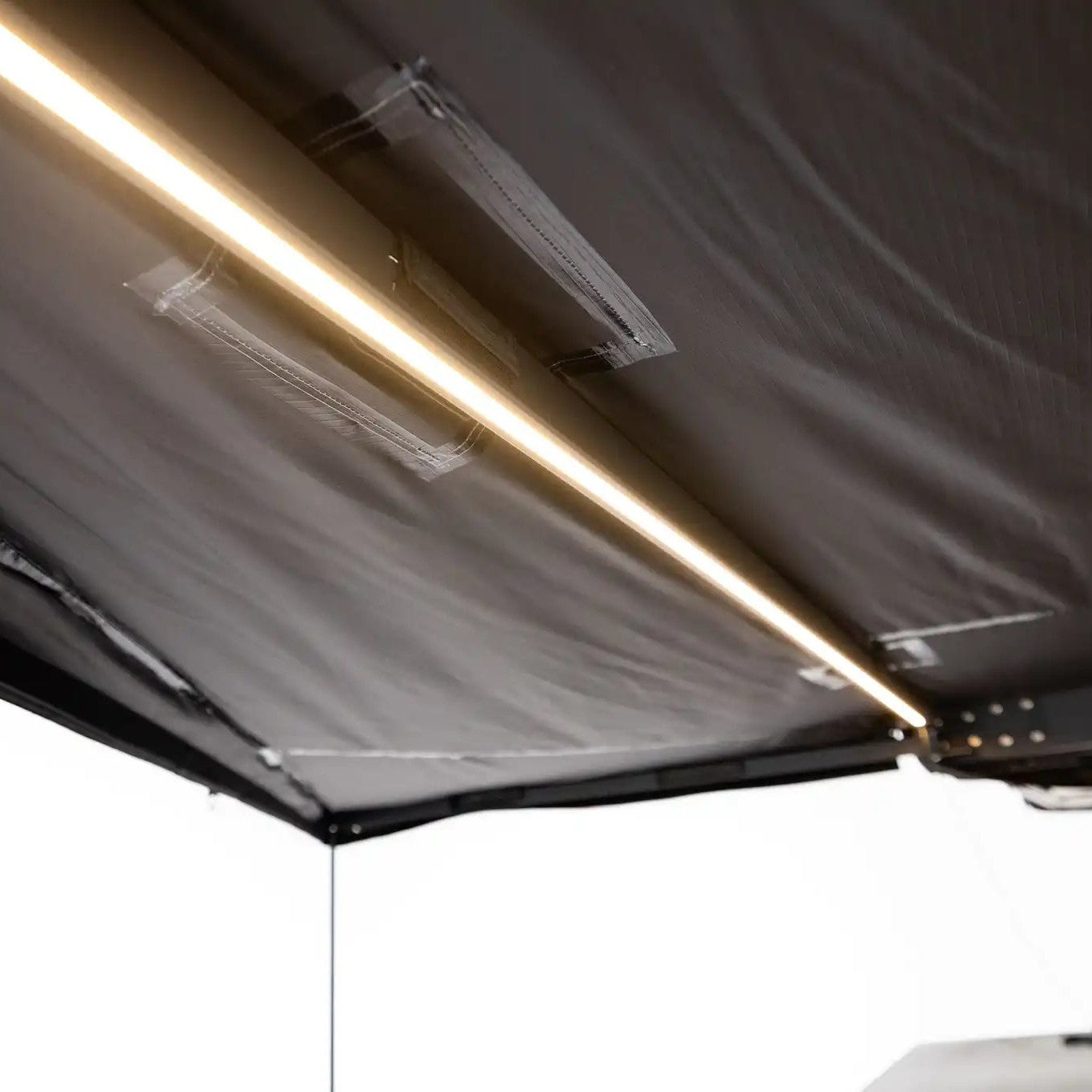 Close up of the illuminated built in LED lights on the FSR 180 Awning for camping, 4wd, suvs, and overland vehicles from Freespirit Recreation