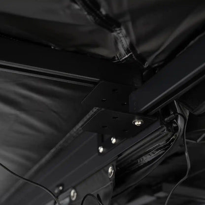 Close-up of the heavy-duty hinge used on the free standing FSR 180 tailgate awning, with built-in LED light wiring visible