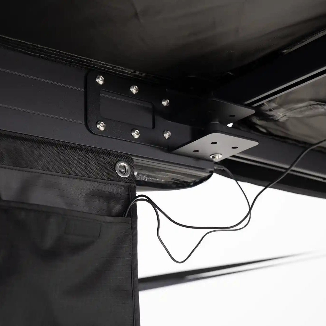 Close-up of the built-in LED lights and wiring on the FSR 180 Tailgate Awning from Free Spirit Recreation