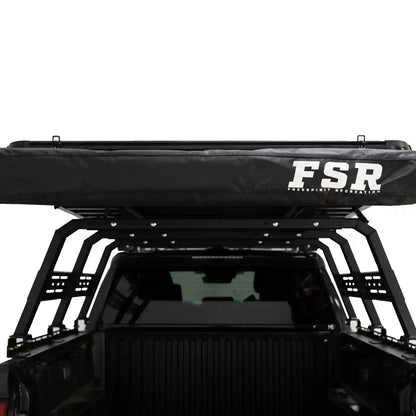 FSR 180 Tailgate Awning mounted on the rear of a 4x4 vehicle and stored in it's heavy-duty storage bag