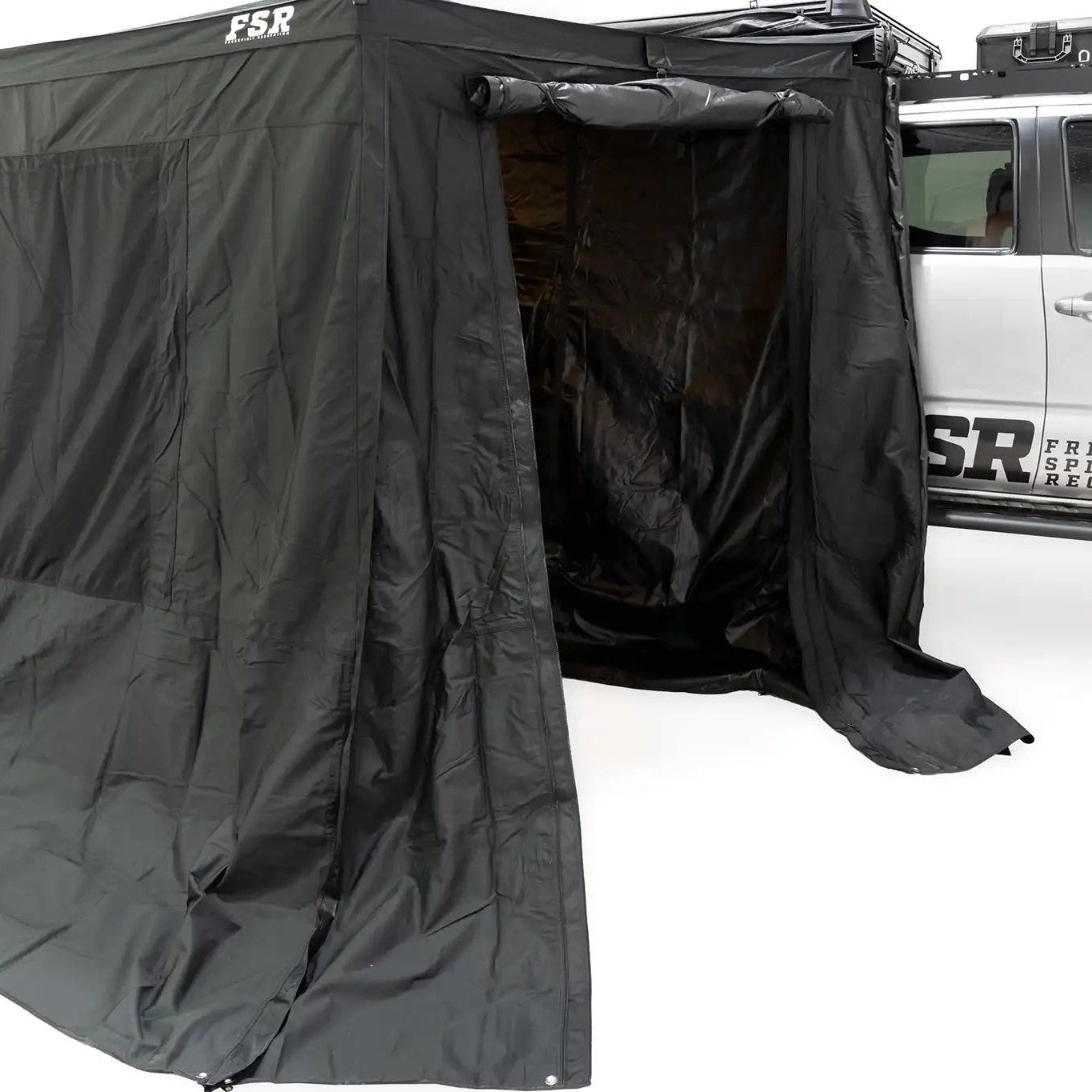 FSR 270 Awning Walls installed on the Freespirit Recreation 270 degree awning with car awning door rolled up and open