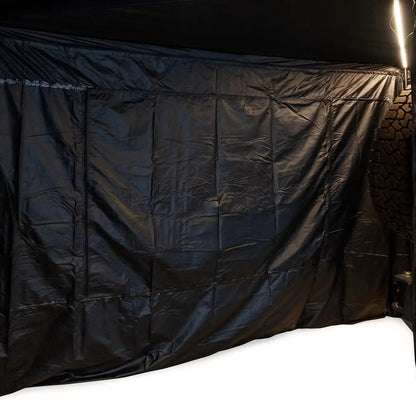 Interior image of the FSR 270 Awning Walls installed on the Freespirit Recreation 270 degree awning with the awning lights illuminated