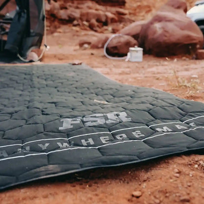 FSR Anywhere Camping Mat in use as a ground pad at a red rock campsite in Moab