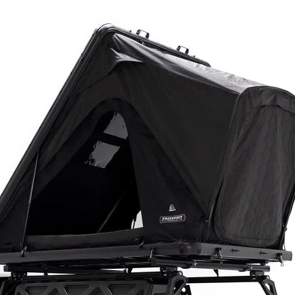 Free Spirit Recreation Aspen Lite XL rooftop tent installed and set up on a truck bed rack